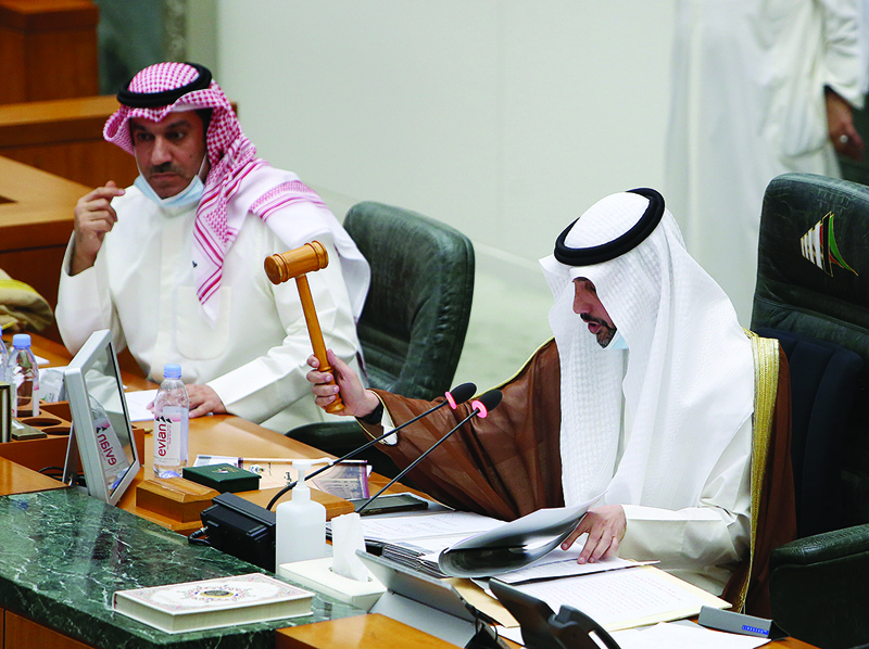 KUWAIT: National Assembly Speaker Marzouq Al-Ghanem (right) is seen during a parliamentary session at the National Assembly on March 30, 2021. - Photo by Yasser Al-Zayyatn