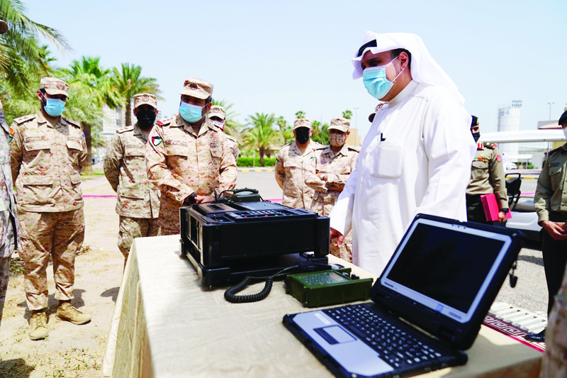 KUWAIT: Deputy Prime Minister and Minister of Defense Sheikh Hamad Jaber Al-Ali Al-Sabah is seen during his visit to the Kuwait signalnCorps. - KUNAn