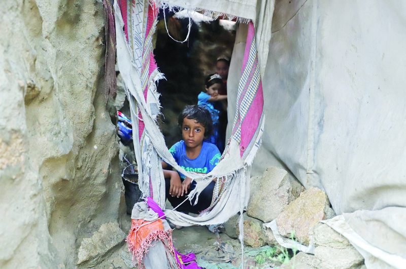 Yemenis displaced by the conflict in the country live in temporary mountain dwellings in the northwestern Al-Azhour range near the Saudi border. - AFPn