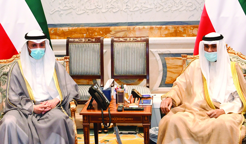 KUWAIT: His Highness the Amir Sheikh Nawaf Al-Ahmad Al-Jaber Al-Sabah meets Parliament Speaker Marzouq Ali Al-Ghanem. - Amiri Diwan and KUNA photosn