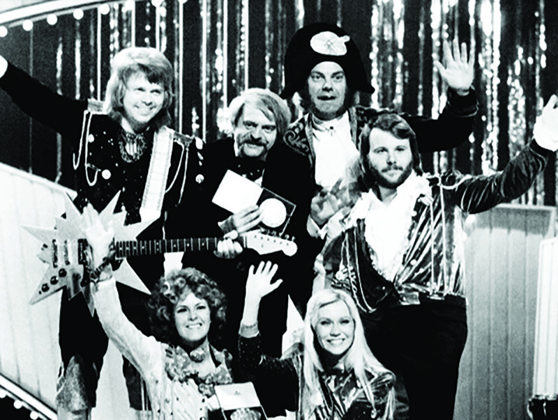 In this file photo taken on April 6, 1974 Swedish band representing Sweden with the song “Waterloo” (from left to right, up) Bjorn Ulvaeus, music producer, writer and manager Stig Anderson, Swedish record producer, composer Sven-Olof Walldoff and Benny Andersson, (from left to right, down) Anni-Frid Lyngstad (Frida) and Agnetha Faltskog, hold the trophy as they celebrate on stage after winning the final of the Eurovision Song Contest 1974 Grand Final in Brighton. — AFP photos