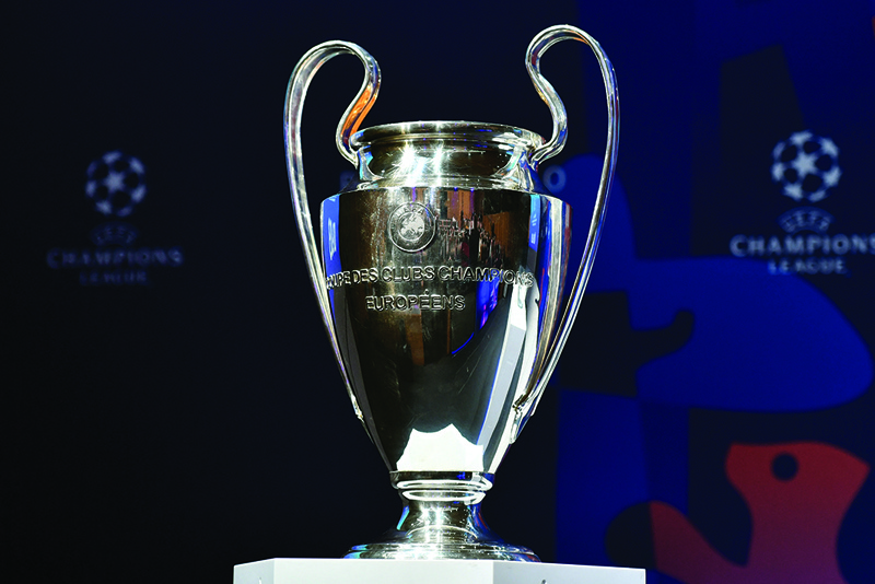 NYON: In this file photo taken on March 15, 2019, the UEFA Champions league trophy is exhibited ahead of the draw for the Champions league quarter-final draw, at the House of European football in Nyon. - AFPnn