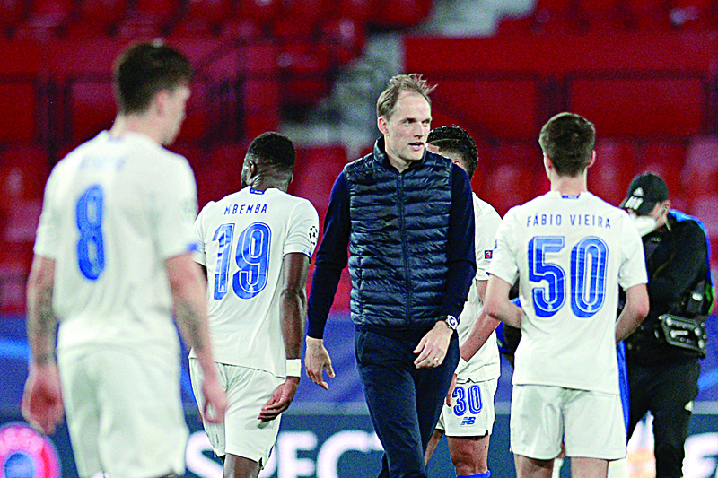 SEVILLE: Chelsea's German head coach Thomas Tuchel (center) walks on the pitch after the UEFA Champions League quarter final second leg football match between Chelsea and Porto at the Ramon Sanchez Pizjuan stadium in Seville on Tuesday. - AFPn