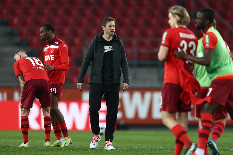 COLOGNE: Leipzig's German headcoach Julian Nagelsmann reacts after the German first division Bundesliga football match FC Cologne vs RB Leipzig, in Cologne, western Germany, on April 20, 2021.-AFPn