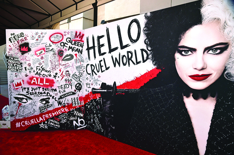 Backdrops and signage are seen at the premiere for Cruella at the El Capitan Theatre. - AFP n