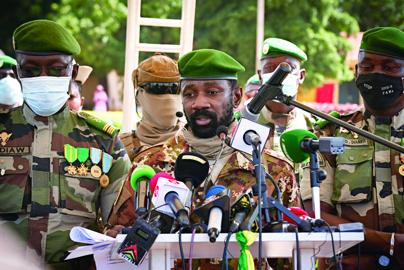 BAMAKO, Mali: In this file photo Colonel Assimi Goita (center), President of CNSP addresses to the press during the ceremony of the 60th anniversary of Mali's independence in Bamako.-AFP n