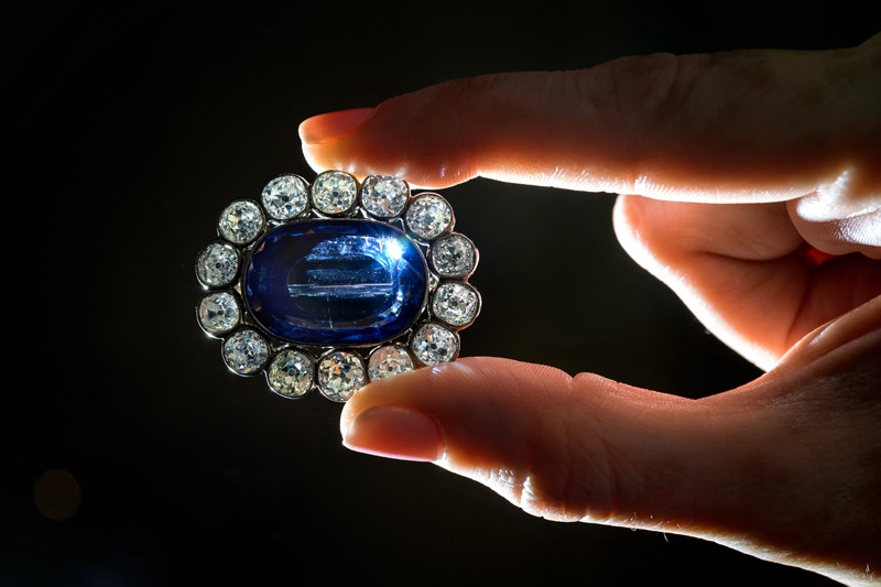 Pictures taken on May 5, 2021 show a sapphire and diamond brooch, made with an oval-shaped sapphire and old-cut diamonds, sapphire and diamond earrings made with pear and cushion-shaped sapphires and old-cut diamonds, and a sapphire and diamond necklace made with octagonal step-cut sapphires, rose and old-cut diamond and gold, all early 19th-century circa 1800 and once owned by Napoleon’s adopted daughter, Stephanie de Beauharnais, during a press preview ahead of sales by Christies auction house on May 12, 2021 in Geneva. – AFP photosnn