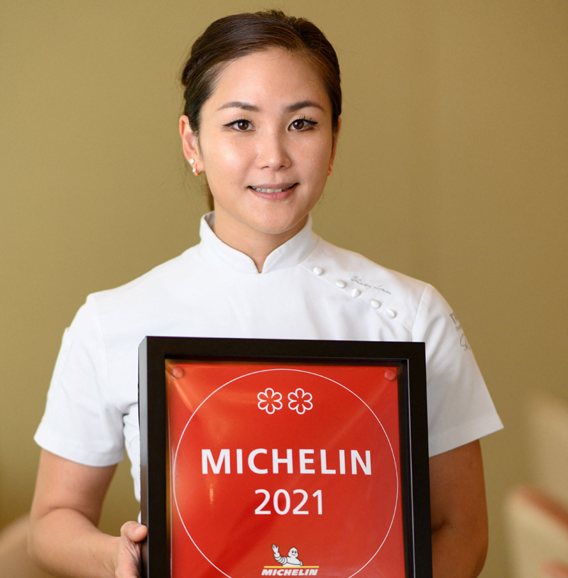 This photo shows Vicky Lau, the only female chef in Asia with a double Michelin star, posing with her award during a portrait session at her restaurant Tate Dining Room in Hong Kong. – AFP photosn