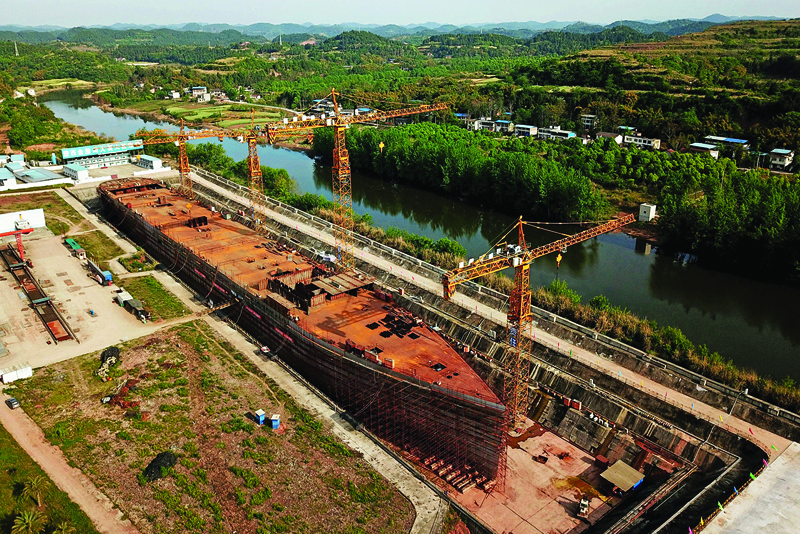 This aerial photo taken on April 27, 2021 shows a still-under-construction replica of the Titanic ship in Daying County in China's southwest Sichuan province. - AFP n