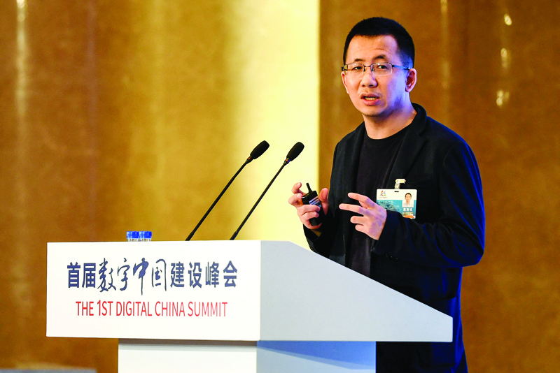 This photo taken on April 23, 2018 shows CEO of Bytedance Zhang Yiming speaking during the 1st Digital China Summit in Fuzhou, in China's eastern Fujian province. - AFPn