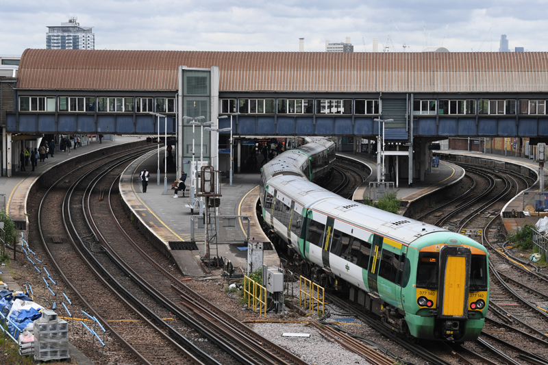 A Southern Rail train leaves Clapham Junction station in London yesterday.-AFPn