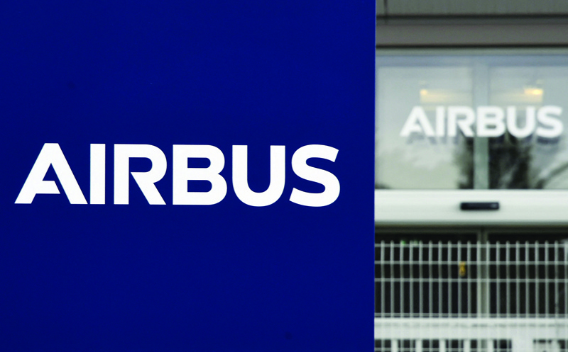 The logo of European aircraft manufacturer Airbus outside the entrance of the site of Airbus' Wings Campus in Blagnac following a European company council. - AFPn