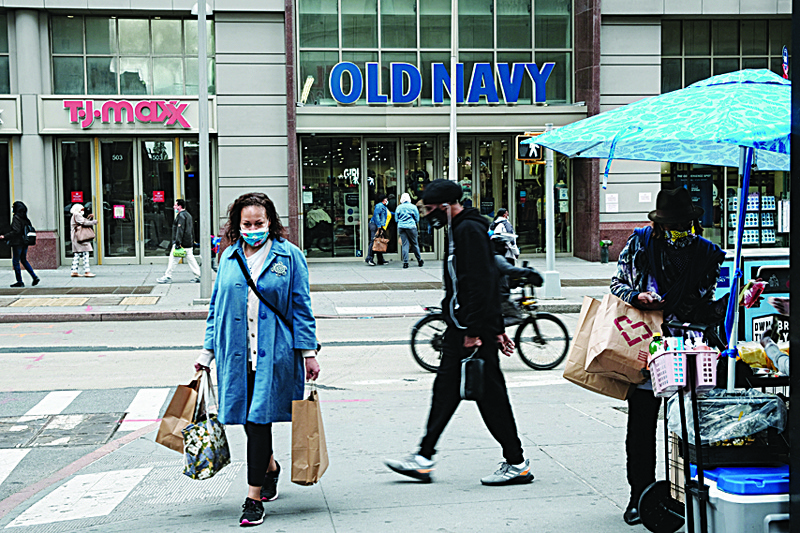 NEW YORK: People shop in downtown Brooklyn in New York City. Businesses in the building, service, hospitality and retail sectors are seeing solid growth as the US economy surges out of the COVID-19 slowdown. - AFPn