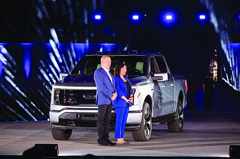 DEARBORN, MI: Bill Ford, Jr, Executive Chairman of Ford Motor Company, and Linda Zhang, Chief Engineer, are shown at the reveal of the new all-electric Ford F-150 Lightning pickup truck at Ford World Headquarters Wednesday.-AFPn