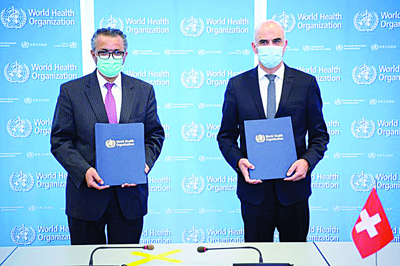Tedros Adhanom Ghebreyesus (left) and Alain Berset after signing the BioHub Initiative in Geneva yesterday.-AFPnn