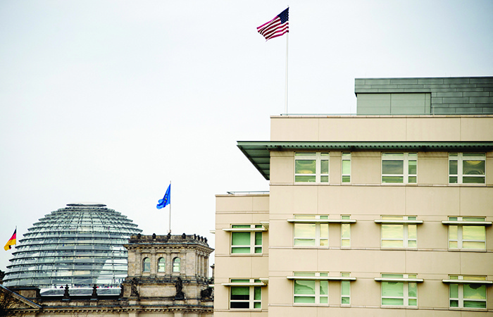 BERLIN: This file photo taken on Oct 25, 2013 shows the US flag flying on top of the US embassy next to the German parliament. — AFP