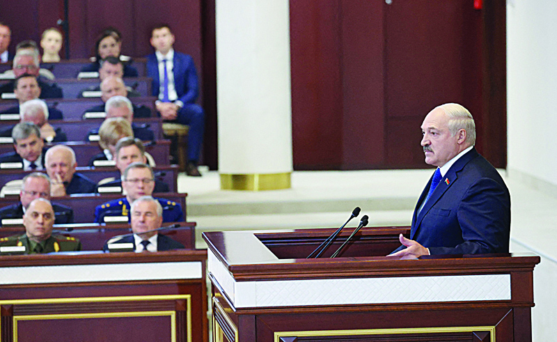 MINSK: Belarusian President Alexander Lukashenko speaks during his meeting with parliamentarians, members of Constitutional Commission and representatives of public administration bodies in Minsk yesterday.-AFPn