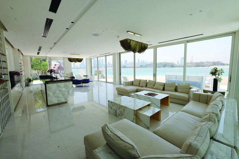 DUBAI: The living room of a luxury villa for sale is seen on the Palm man-made island on May 19, 2021. - AFP  nn