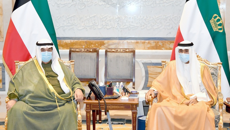 KUWAIT: His Highness the Amir Sheikh Nawaf Al-Ahmad Al-Jaber Al-Sabah meets His Highness Sheikh Nasser Al-Mohammad Al-Sabah. - Amiri Diwan and KUNA photosn