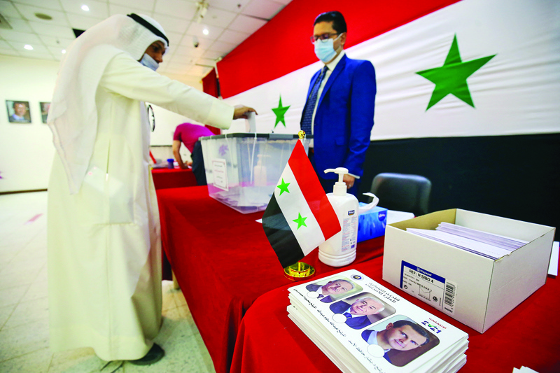 KUWAIT: Syrians living in Kuwait cast their vote for the presidential election at the Syrian Embassy in Mishref yesterday. - Photos by Yasser Al-Zayyatn