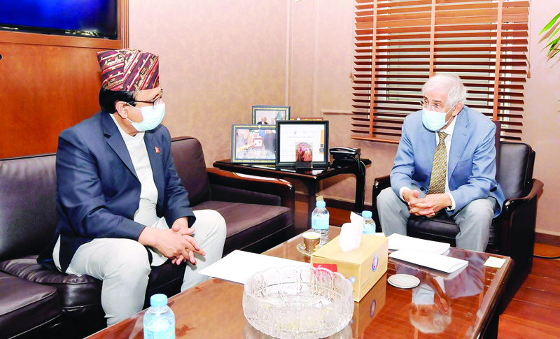 KUWAIT: Ambassador of Nepal to Kuwait Durga Prasad Bhandari (left) meets KRCS Chairman Dr Hilal Al-Sayer. - KUNAn
