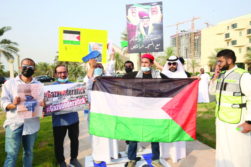 KUWAIT: Kuwaitis protest in solidarity with the Palestinian people in Kuwait City yesterday. - Photos by Yasser Al-Zayyatn