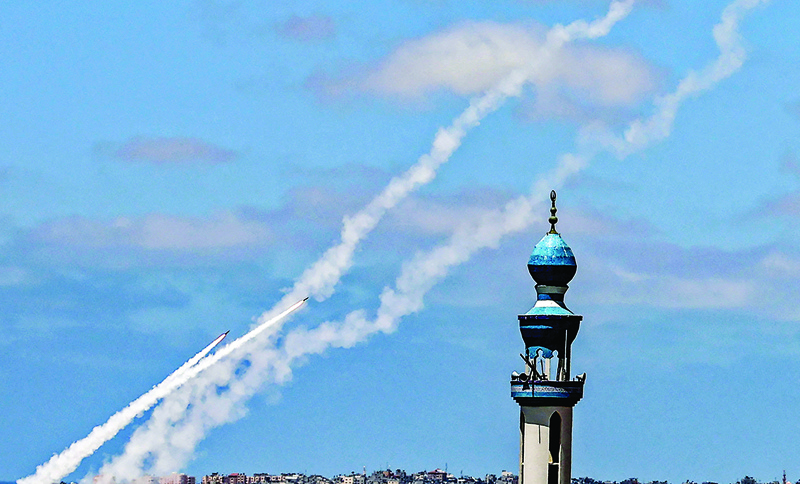 This picture shows rockets being fired from Rafah in southern Gaza Strip toward Zionist state yesterday. - AFP photos