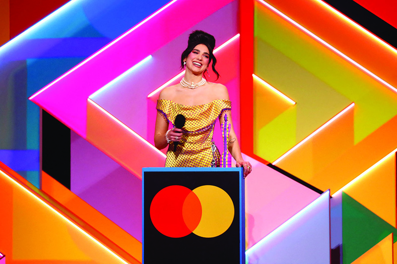 In a handout picture released by the Brit Awards English singer-songwriter Dua Lipa accepts her award for Female Solo Artist at the BRIT Awards 2021 in London.—AFP photosn