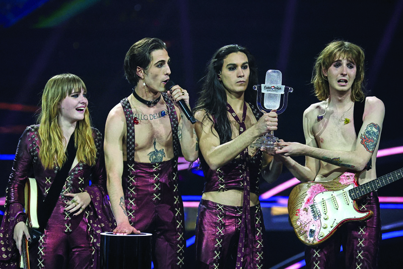 Italy's Maneskin celebrate on stage with the trophy after winning the final of the 65th edition of the Eurovision Song Contest 2021, at the Ahoy convention centre in Rotterdam.—AFP n
