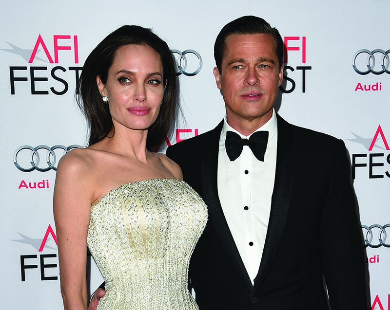 In this file photo Writer-director-producer-actress Angelina Jolie Pitt (left) and actor-producer Brad Pitt arrive for the opening night gala premiere of Universal Pictures' 'By the Sea' during AFI FEST 2015 presented by Audi at the TCL Chinese Theatre in Hollywood.-AFP n