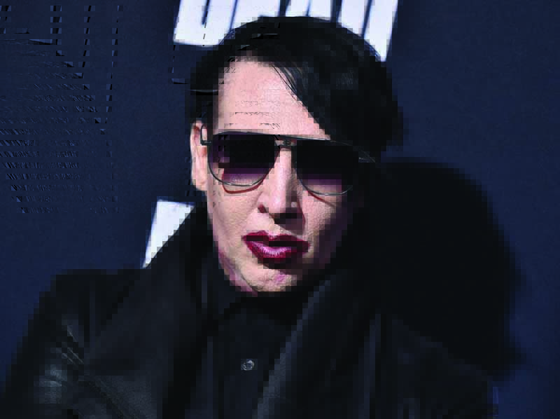 In this file photo Marilyn Manson attends the Season 10 Premiere of 'The Walking Dead' at Chinese Theatre in Hollywood, California.—AFP n