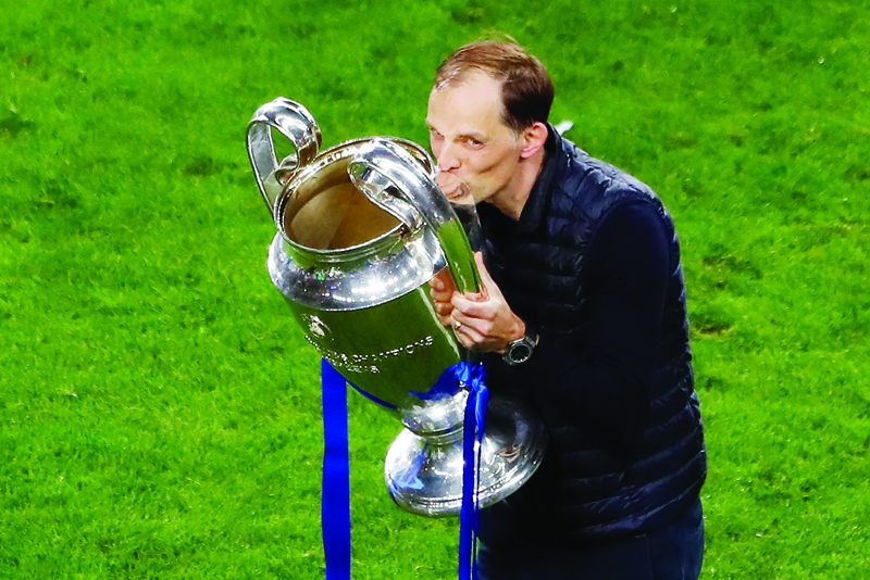 PORTO: Chelsea's German coach Thomas Tuchel celebrates with the trophy after winning the UEFA Champions League final football match at the Dragao stadium in Porto on Saturday. - AFPnn