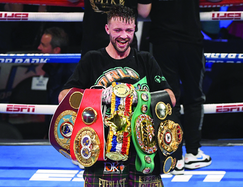 LAS VEGAS: Josh Taylor poses with his title belts after his win by unanimous decision over Jose Ramirez in their junior welterweight world unification title fight at Virgin Hotels Las Vegas on Saturday in Las Vegas, Nevada. - AFPn