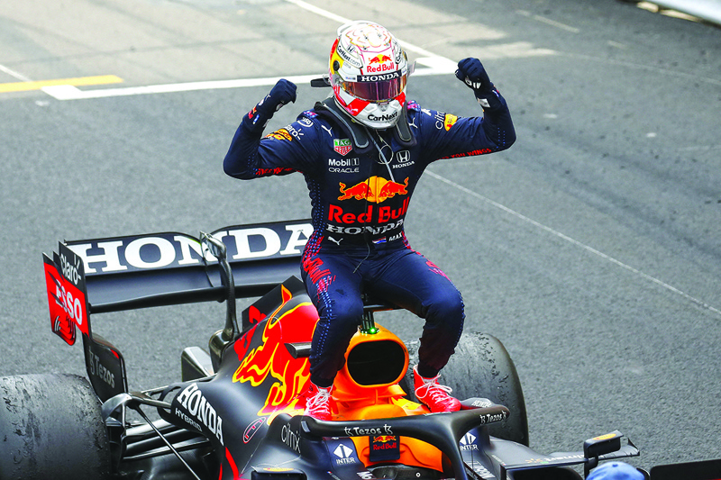 MONACO: Winner Red Bull's Dutch driver Max Verstappen celebrates after the Monaco Formula 1 Grand Prix at the Monaco street circuit in Monaco, on Sunday. - AFPn
