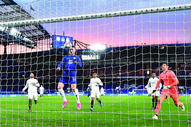 LONDON: Chelsea's German striker Timo Werner headers a rebounding ball to score the opening goal during the UEFA Champions League second leg semi-final football match between Chelsea and Real Madrid at Stamford Bridge in London on Wednesday. – AFPn