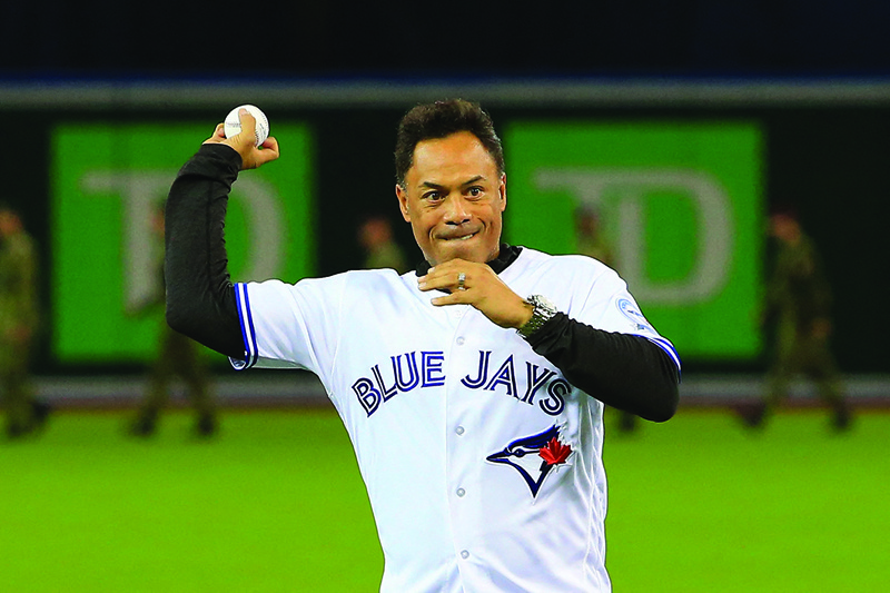 TORONTO: In this file photo taken on Oct 4, 2016, former Major League Baseball player Roberto Alomar throws out the ceremonial first pitch prior to the American League Wild Card game between the Toronto Blue Jays and the Baltimore Orioles at Rogers Centre. – AFP n