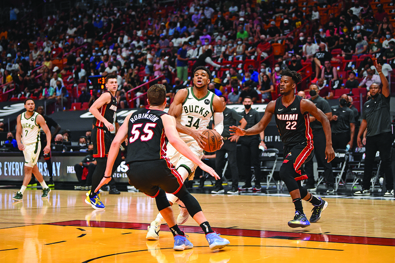 MIAMI: Giannis Antetokounmpo #34 of the Milwaukee Bucks drives to the basket against the Miami Heat during Round One Game Four of the Eastern Conference Playoffs on Saturday at AmericanAirlines Arena in Miami, Florida. - AFPn