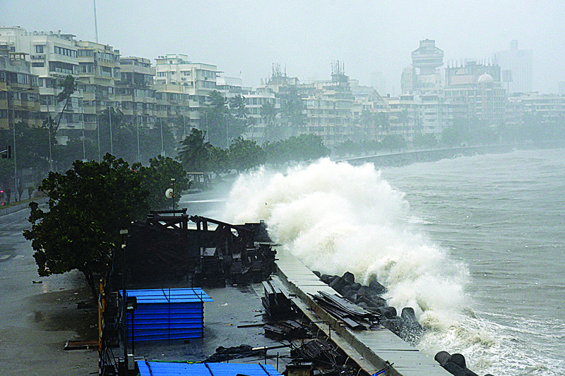 MUMBAI: Waves lash over onto a shoreline in Mumbai yesterday as Cyclone Tauktae, packing ferocious winds and threatening a destructive storm, surge bore down on India, disrupting the country's response to its devastating COVID-19 outbreak. - AFPn