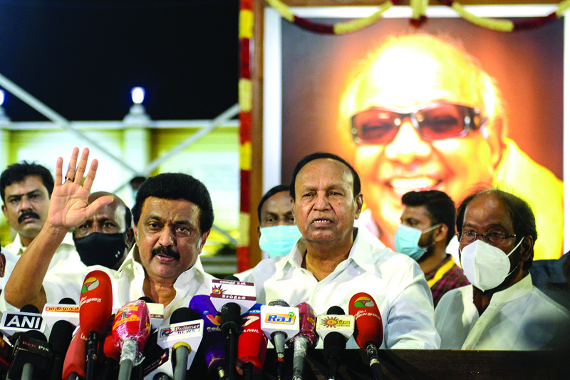CHENNAI: Chief Minister-elect of Tamil Nadu MK Stalin (left) of Dravida Munnetra Kazhagam (DMK) party, gestures as he delivers a speech during a press conference after winning the Tamil Nadu State election, at the memorial of his father and late Chief Minister of Tamil Nadu, M Karunanidhi.-AFPn