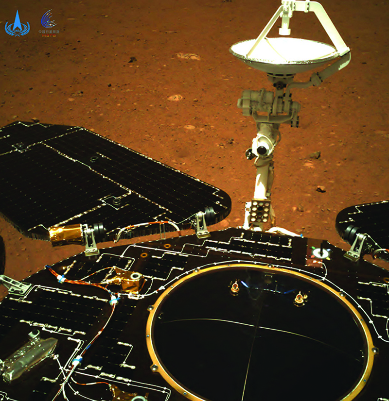 This picture shows an image taken by the navigation camera of China's Zhurong rover on the surface of Mars, showing the rover's solar panels and antenna, after it landed on Mars.-AFP n