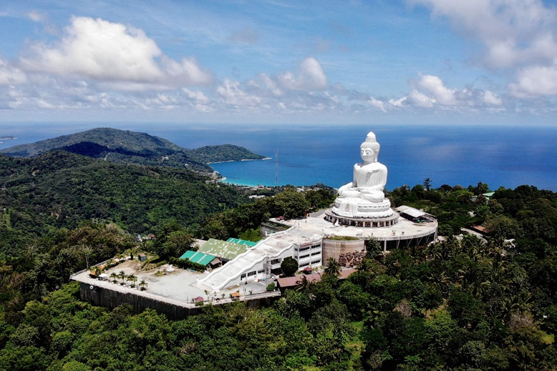 An aerial photograph of the Big Buddha and Kata Beach behind it yesterday, a day before the “Phuket Sandbox” tourism scheme that allows visits by people vaccinated against the COVID-19 coronavirus is set to launch. – AFPn