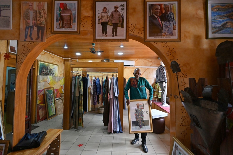 Ivorion-Burkinabè fashion designer Pathé Ouedraogo, known as Pathé’O, poses for a photograph in his store in Abidjan. — AFP photosn