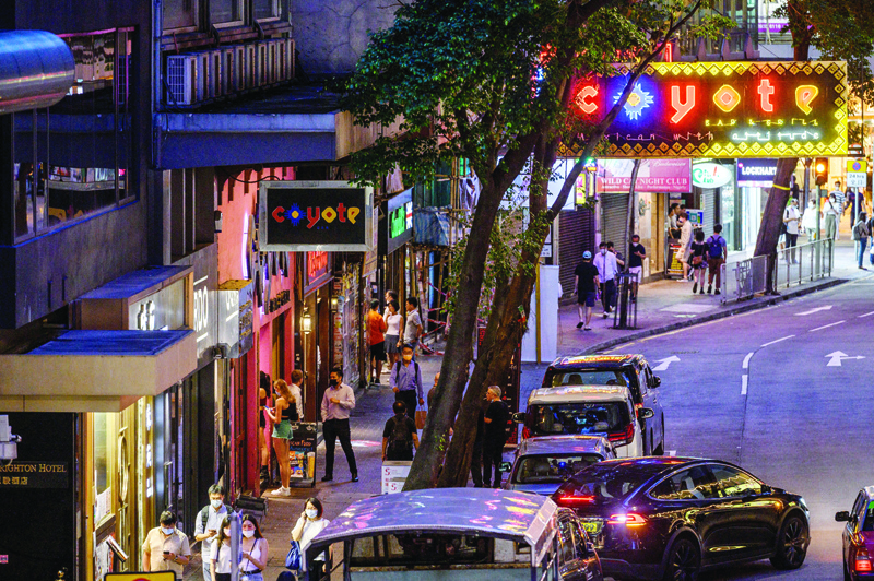 HONG KONG: This picture taken on June 9, 2021 shows a general view of bars and local businesses in the popular entertainment district Wanchai in Hong Kong. - AFPnn