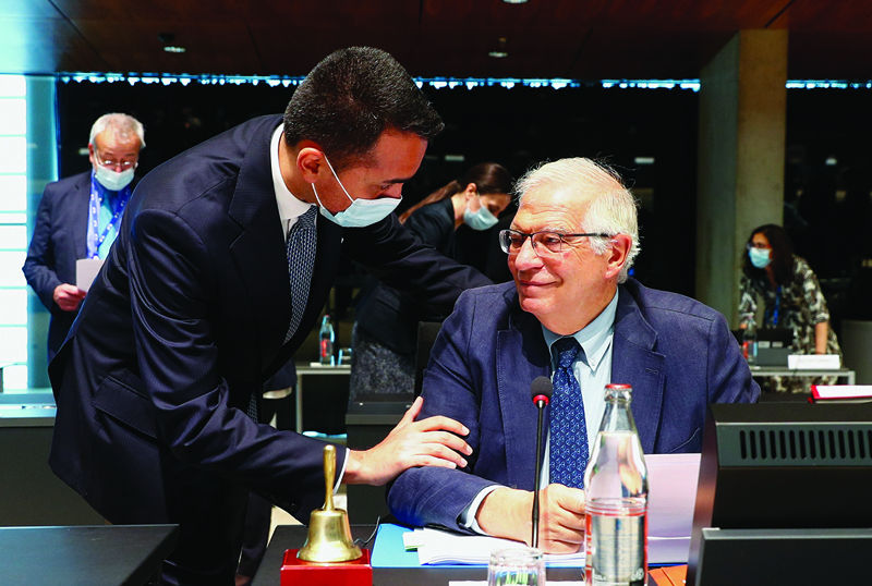 LUXEMBOURG: Italian Foreign Minister Luigi Di Maio speaks with European Union Foreign Policy Chief Josep Borrell during a European Union Foreign Ministers meeting, in Luxembourg, yesterday.-AFPn
