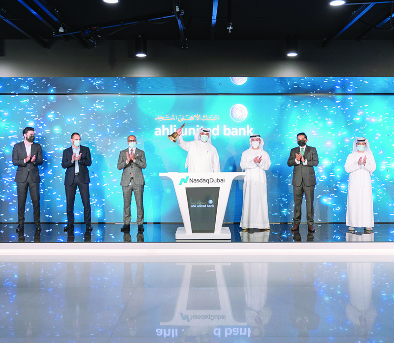 Abdullah Al-Langawy rings the Nasdaq Dubai market opening bell to celebrate the listing of the AUB's Sukuk.