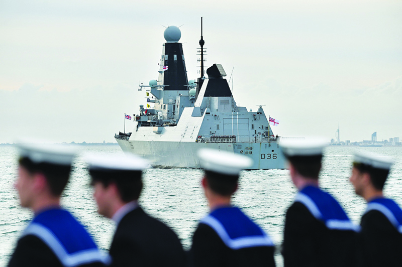 PORTSMOUTH: File photograph taken on June 5, 2019, shows HMS Defender prepares to take part in a sail past to honour D-Day veterans on board the Royal British Legion's ship MV Boudicca en route to Normandy, in the Solent off the coast of southern England. - AFPnn