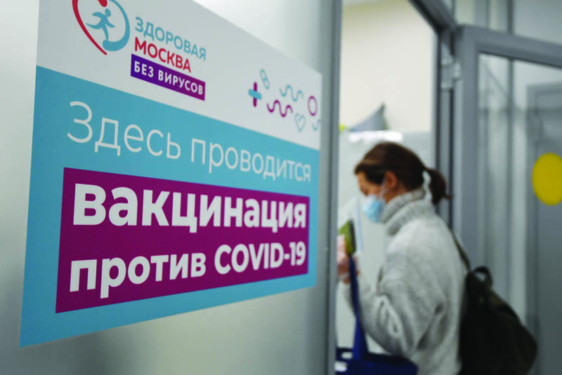 MOSCOW: A woman enters a vaccination point to receive an injection of Russia's Sputnik V (Gam-COVID-Vac) vaccine against the coronavirus disease in a public services office in Moscow. - AFPn