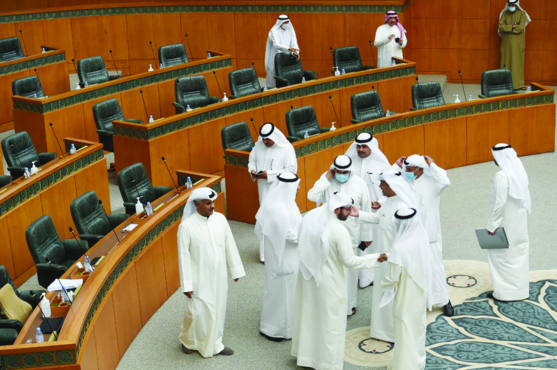 KUWAIT: MPs gather in the National Assembly hall after Speaker Marzouq Al-Ghanem cancelled the special session due to a no-show by government ministers yesterday. - Photo by Yasser Al-Zayyatnnn
