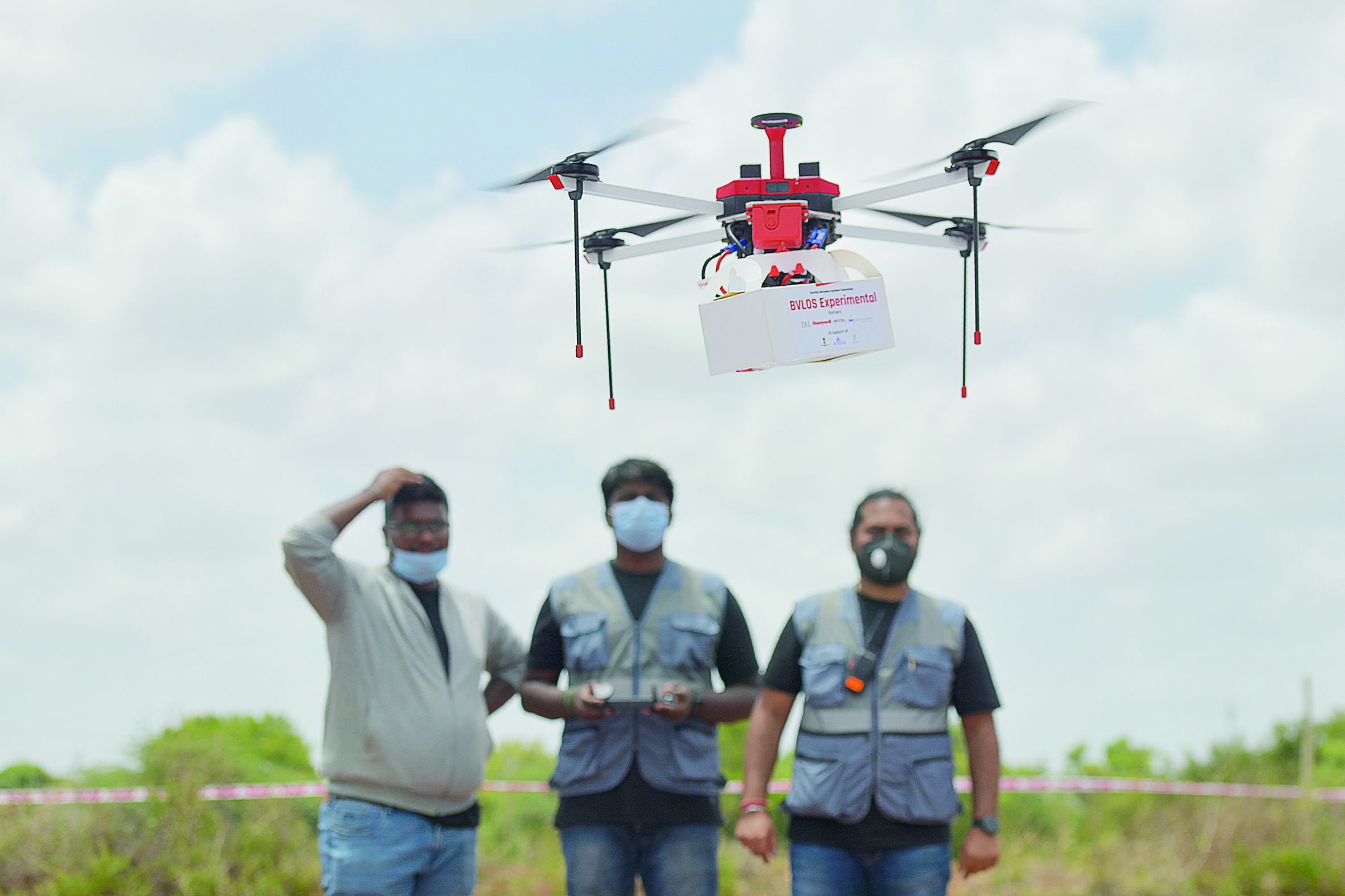 GAURIBIDANUR, India: Technicians fly a drone belonging to Throttle Aerospace Systems which flies Beyond Visual Line of Sight to deliver lifesaving medical supplies during a test flight on Monday. - AFP n