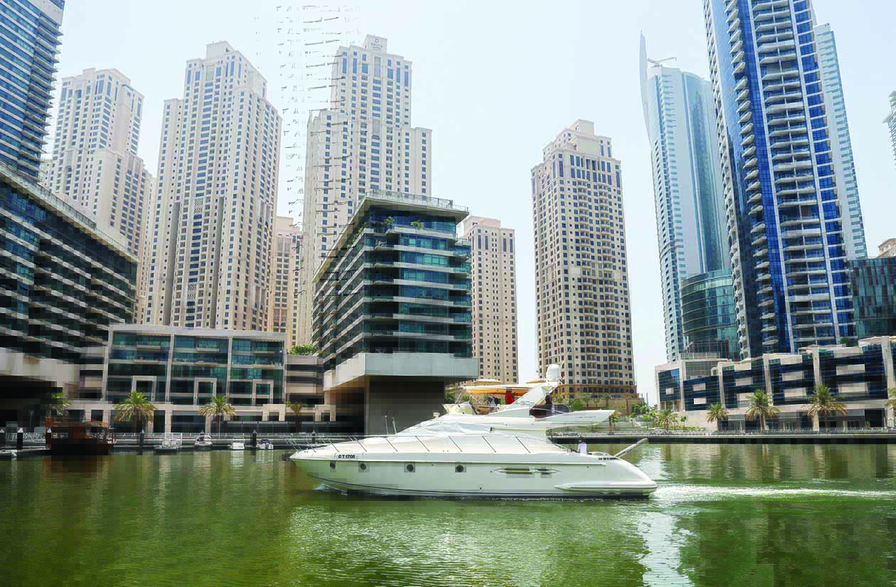 DUBAI: A luxury yacht is pictured at the Dubai Marina on June 10 2021. - AFPnn